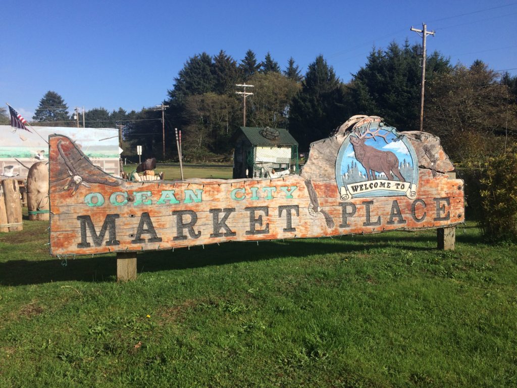 ocean sity marketplace carved sign by judy mcvay