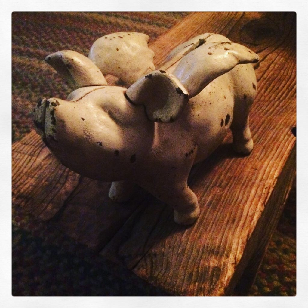 old cast iron flying pig bank